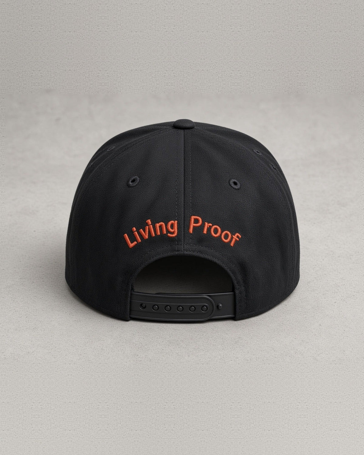 Living Proof snapback hat back: Living Proof stitched in red script above the snap closure