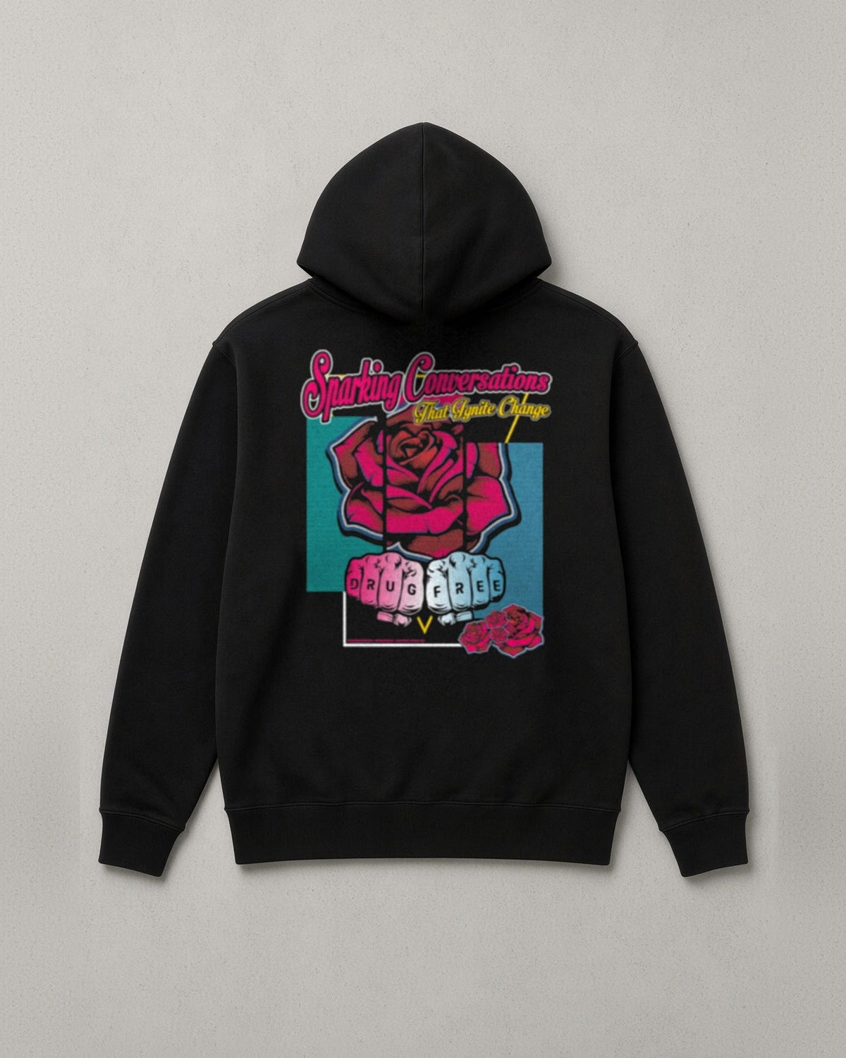 Drug Free hoodie back print: neon script Sparking Conversations That Ignite Change over a red rose and two fists with DRUG FREE on the knuckles
