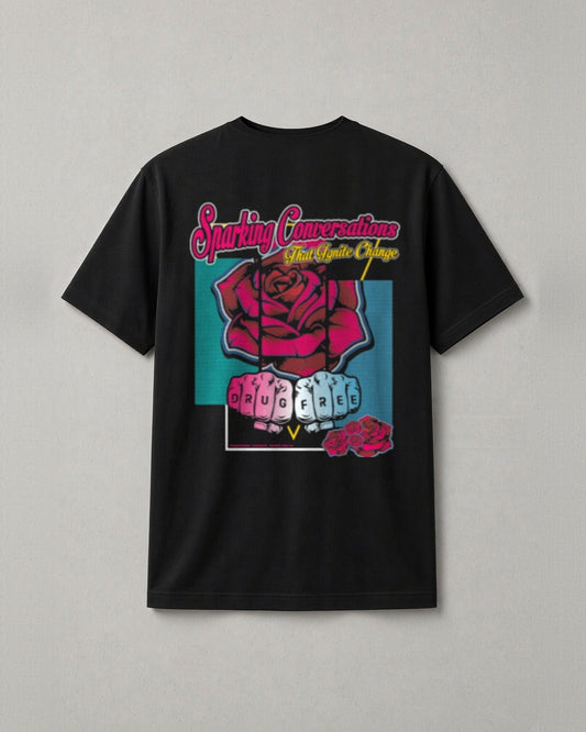 Drug Free t-shirt back print: neon script Sparking Conversations That Ignite Change over a red rose and two fists with DRUG FREE on the knuckles