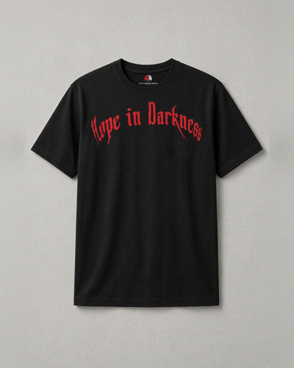 Hope in Darkness t-shirt front: red blackletter Hope in Darkness across the chest of a black tee