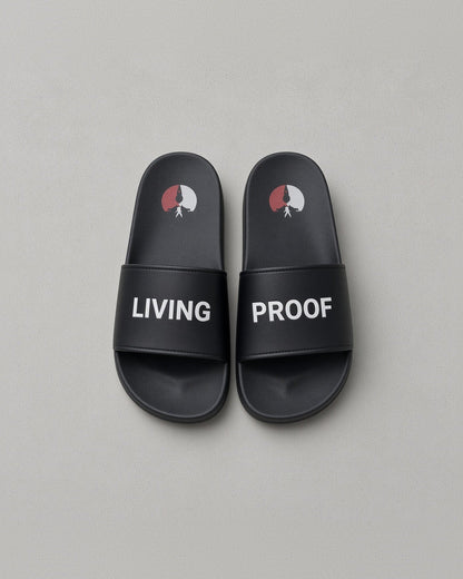 Living Proof slides: black slides reading LIVING on the left strap and PROOF on the right