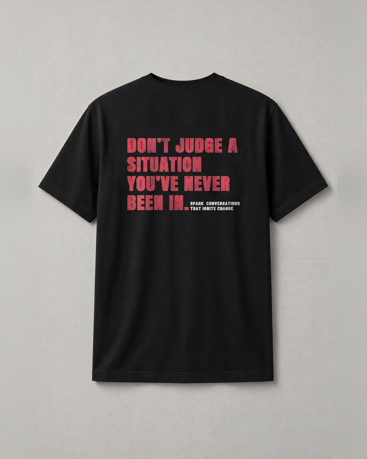 Situations t-shirt back print: Don't judge a situation you've never been in, in bold red letters
